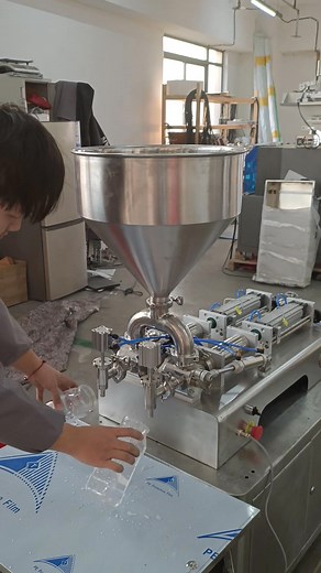 Semi-automatic double-head paste filling machine. Piston filling machine | Henan Cyril Machinery Equipment Co.,LTD