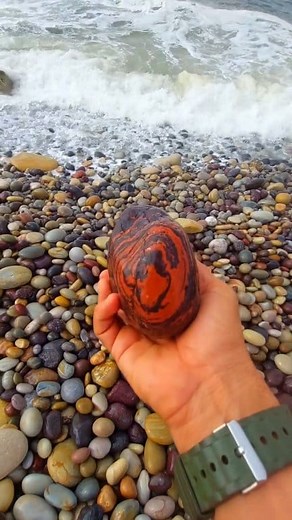 4.6K views · 619 reactions | Mahogany obsidian is a natural siliceous glass with iron inclusions that create distinctive mahogany-colored stripes and swirls. The swirling, organic patterns in the of this stone are characteristic of obsidian's flow patterns. | Omar Nacer | Facebook