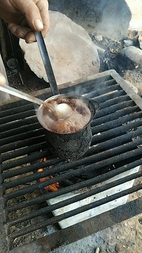 Brewing Rustic Coffee Over an Open Flame
