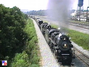 On their way to the 1991 NRHS Convention in Huntington, WV, Nickel Plate #765 and Pere Marquette #1225 haul some freight which will get dropped off at the yard in Russell, KY. We then get a look at N&W #1218, also part of the convention. From the GSVP show "Steam in Huntington The 1991 NRHS Convention" https://rfd.video/Hunt1991 | Steam Giants