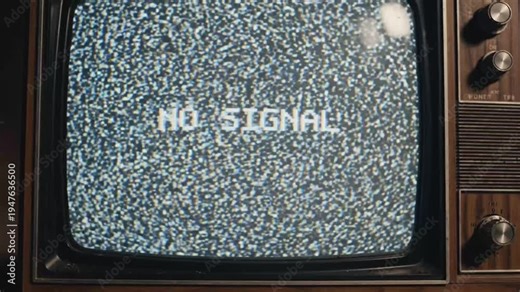 Vintage television screen displaying static 'no signal' message with the wooden casing and analog dials add to its vintage aesthetic with no signal