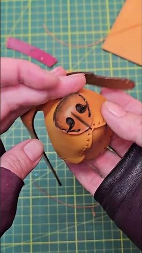 My leather dog is starting to see! 👀 Making the eyes #leathercraft #wip #bagmaking #diy