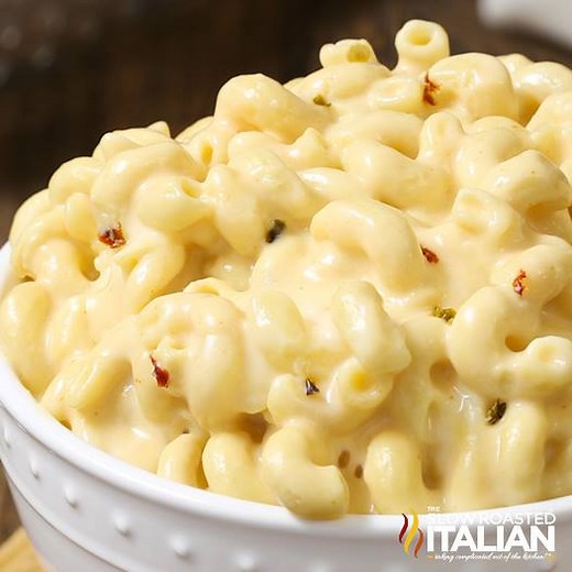 Slow Cooker Triple Cheesy Mac and Cheese is the BEST EVER mac and cheese! Rich, creamy and oh so dreamy. Toss it all in the slow cooker and it basically cooks itself! 🧀 😋 https://www.theslowroasteditalian.com/2017/10/slow-cooker-triple-cheesy-mac-cheese-recipe.html