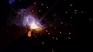 Industrial Metal Welding Sparks and Flashes Flying