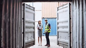 Asian business woman in suit jacket holding clipboard and dock worker staff working then use barcode scanner check the product for import and export. Transportation and Logistics concepts. Stock Video