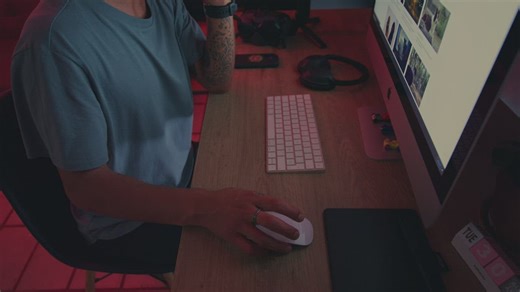 Young man working in front of a computer - Free Stock Video