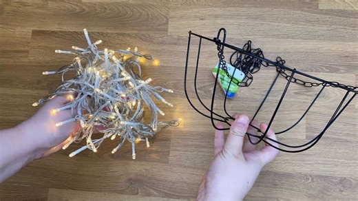 Wrap string light around a Dollar Store basket for this breathtaking new idea!