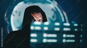 Hooded hacker jamming satellite signals, stealing sensitive information, hacking