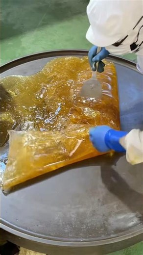 Golden toffee pouring like liquid gold ✨🍯From the kettle to the tray pure sweetness in the making!