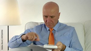 Businessman Making Accounting Work Calculating Finance Using Adding Machine