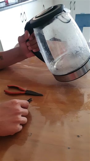 D.I.Y Fix on a Salton Kettles switch 👌 . . Today I ended up fixing a kettle at home. I didn't have the correct tools on hand but atleast we were able to fix it. The switch was not clicking on and off and this was simply just the metal spring or clip that got dislodged. I hope you enjoyed this video 💪 . . #SAMA28 #howtotutorial #howto #tutorial #simple #viralvideo #workvideos #Electrical #electrician #work #repair #kettle #salton