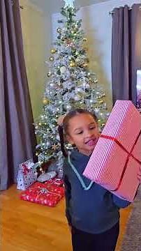 The kids putting the presents under the Christmas tree #familymoments #christmasvibes #christmas2025