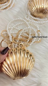 Just see the detailing of our shell clutch 🐚 PS : I don’t own the music! | Sparkle Trendy Threads