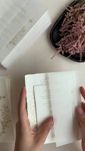 Assembling these pretty wedding invitations. They are gold foil press printed on handmade paper, featuring one of our semi-custom designs, that is both romantic and timeless. #wedding #weddinginvitation #letterpress #weddingtiktok #weddingtiktok #weddingtiktok #weddingday #papiradesign #weddingplanning #weddingideas #weddinginspo #invitation #invitatiinunta #invitaciones