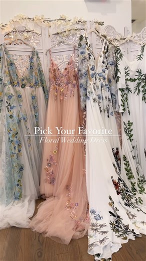 14K views · 2.9K reactions | Pick Your Favorite | Floral Wedding Dress ✨ Primrose , Rosa , Nahla , or Olive ✨ • • #bridetobe #weddingdress #nontraditionalwedding #bridal #bridaldress #ISaidYes #ISaidYes #weddinginspo #bridalfashion #uniqueweddingdress #weddingdressinspo #weddingdaystyle #dressgoals | Flora & Lane | Facebook