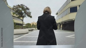 thief stealing money to a woman at the cash machine bancomat,robber male robbing caucasian female atm point of view