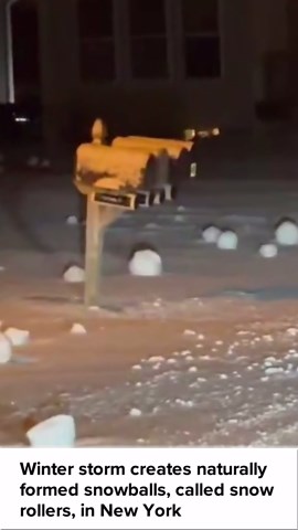 Winter storm creates naturally formed snowballs, called snow rollers, in New York