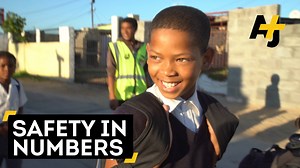 Gang violence in South Africa's Wesbank Township is so bad that kids aren't safe walking to school alone. So the community created the Walking Bus. | AJ