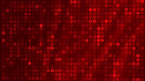 Download Red background with a pattern of small circles. Suitable for graphic design projects, printing materials, social media graphics, and website backgrounds. for free