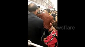 Two couples fight for seat on subway in China