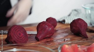 Step by step. Slicing beetroot into the small cubes for beet soup, borscht.