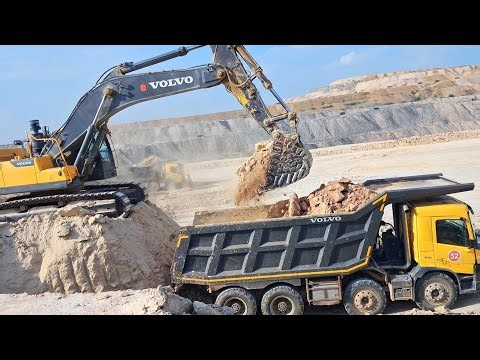 Loading stock material onto trucks using various equipment the material, quantity, and truck