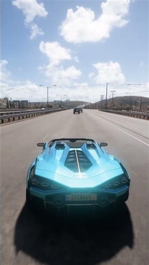 “6th gear, roof open, blue Lambo tearing highways at max speed in FORZA.Pure adrenaline, zero limits
