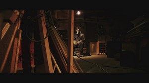 Man with a mask sitting on a chair - Free Stock Video