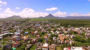 amazing landscape from a Drone Flight over the town of Flic en Flac in mauritius, travel and holiday desitination concept