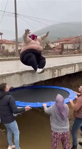 Woman Jumps Off Bridge on Mini Trampoline! (Fails)