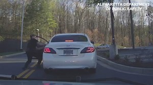 Dashcam video shows officer dragged by DUI suspect who tried to get away - twice