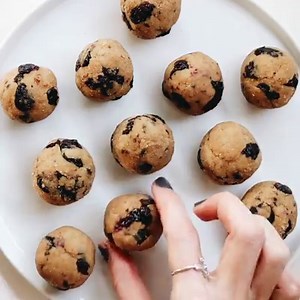 85K views · 434 reactions | {NEW} Blueberry Mufifns Bites! Tasty little balls of blueberry muffin that are unbaked but still fluffy like cake and healthy too Plus an easy trick for dried blueberries in the oven. Vegan, gluten-free, paleo! RECIPE >>> https://www.feastingonfruit.com/blueberry-muffin-bites/ | Feasting on Fruit | Facebook
