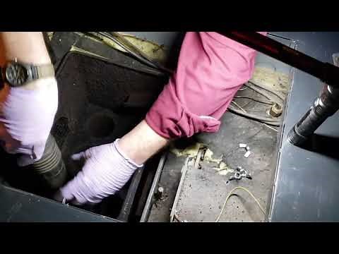 Cleaning and operating Tarm Solo wood fired boiler.