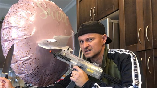 Hilarious balloon battle! Machine Gun Danny vs. the unpoppable clown balloon