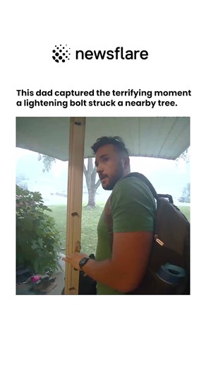 Newsflare on Instagram: "A dad in Jackson County, United States, captured the terrifying moment a lightenig bolt struck a tree in his yard while he waited for his son. The filmer, who captured the moment on his doorbell camera, says as he left the house he "noticed the downpour of rain," and his son went to fetch an umbrella. What would you do in this situation? ☔️ #weather #lightning"
