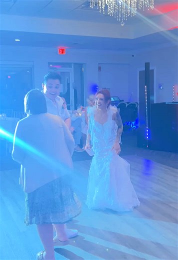 Surprising the Groom with Playful Bride Photos