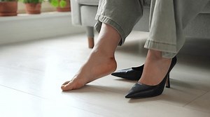 clip-3500618319-female-hands-gently-treating-callus-on-foot