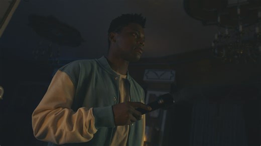 Man with a flashlight exploring a haunted house - Free Stock Video