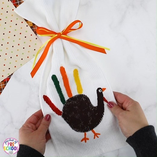 How to make the cutest Turkey Handprint Towel! https://pocketofpreschool.com/turkey-handprint-towels-and-kid-made-thanksgiving-cards/ | Pocket of Preschool