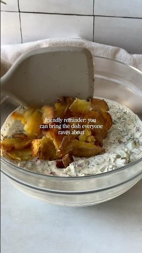 Crispy smashed potato salad w dill pickles and yogurt dressing 🤤 easy summer side! Recipe below ⬇️