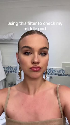 Emmabrooksmcallister (@emmabrooksmcallister) - Understanding Hair Curvature: Bella Brooks' Middle Part Haircut