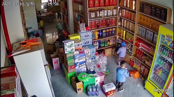 Young boys smash 23 bottles of alcohol in Chinese supermarket leaving mother embarrassed
