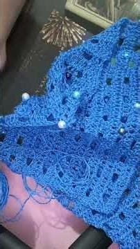 How I add my pearl beads to crochet poncho #crochet #crochetshorts #crocheteveryday #moderncrochet