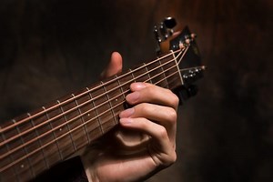 Why Are My Guitar Strings So Hard To Press Down? - (8 Reasons)
