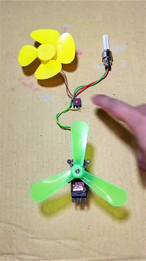 Gear model generated power to power a DC motor fan and light a bulb #gear #motor #diy #mathpix