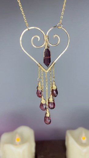 Garnet beaded heart in 14k gold fill wire ✨ I decided to make something similar to my last viral reel, but with a valentines theme ❤️‍🔥 What do you think of the final piece? This necklace will be a part of the Valentines Restock on January 28th at 3 pm est 💘 #wirewrappedcrystals #garnet #garnetnecklace #crystalpoint #facetedgarnet #14kgoldfilled #wirewrapsofig #jewelryprocess #jewelrygram #valentinesjewelry #heartnecklace | Druzy Daze