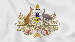 Download national emblem coat of arms or symbol of australia in waving flag. smooth 4k video seemless loop for free