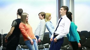team building, group discussion or therapy. people perform an exercise.