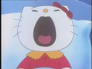 Kitty screaming in bed.