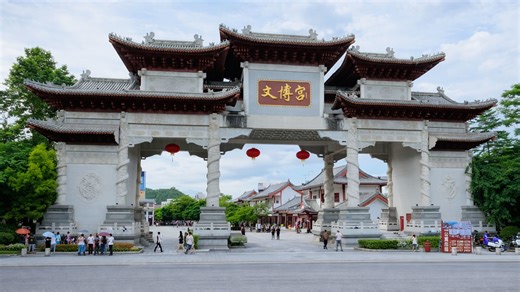 In China a monumental gate opens into a historic style environment